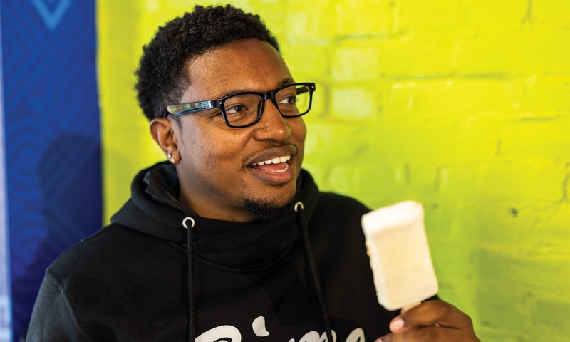 BRAIN FREEZE: ز,Ȳַ
######### Social Media Manager Anthony Ledgyard cools down with a pi?a colada popsicle before swearing off ice cream for the near future.