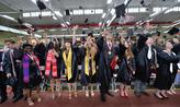 Members of the ز,Ȳַ
######### Class of 2018 toss their mortarboards