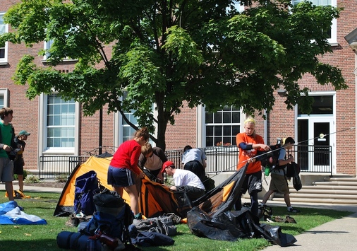 Students packing tents