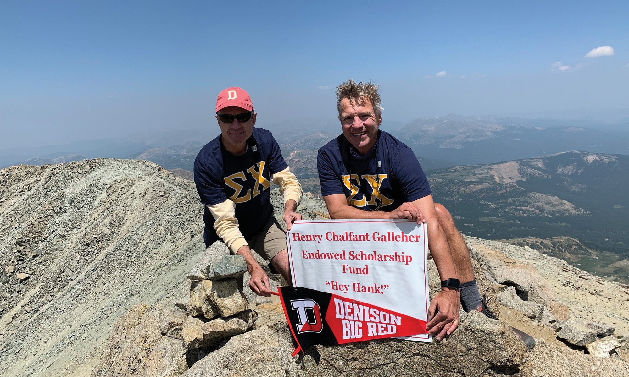 MILE HI: Scott Aiken 83 and Jay Snouffer 83 decked out in their Sigma Chi shirts at the top of Mount Massive.