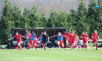 Members of the men’s soccer team run off the bench to celebrate a conference tournament championship. (Shannon O’Brien)